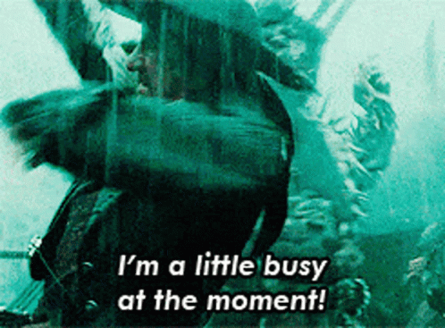 A Blurred Image With The Words I 'M A Little Busy At The Moment On It GIF