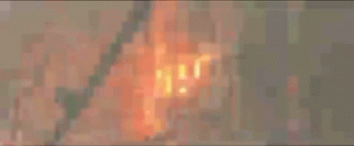 A Blurry Image Of A Person 'S Feet With A Light Coming Out Of Them GIF