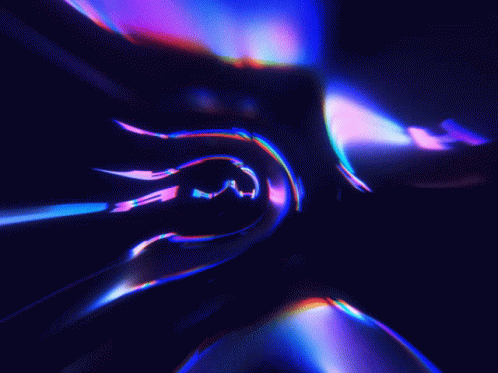 A Blurry Image Of A Purple And Blue Colored Object GIF