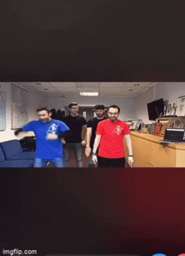 A Blurry Photo Of People Dancing In Front Of A Cse Sign GIF