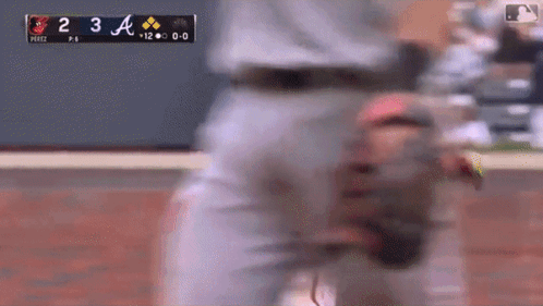 A Blurry Picture Of A Baseball Game Between The Pirates And The A's GIF