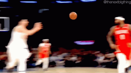 A Blurry Picture Of A Basketball Game With The Next Blg Thing In The Corner GIF