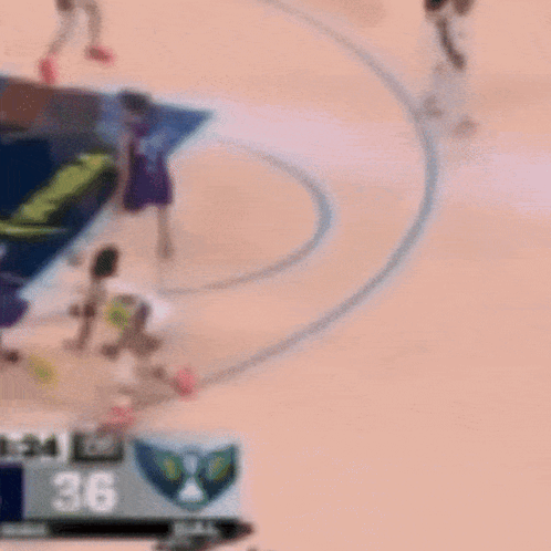 A Blurry Picture Of A Basketball Game With The Number 36 In The Corner GIF