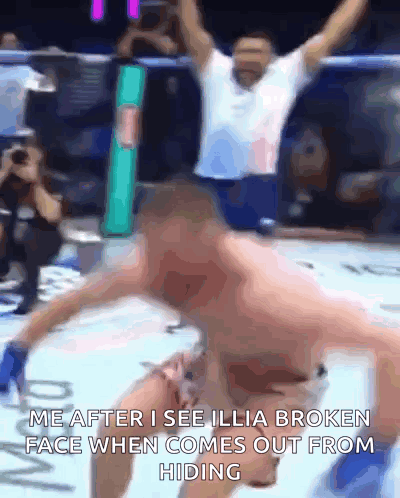 a blurry picture of a boxing match with the caption me after i see ilia broken face when comes out from hiding .