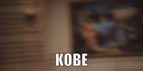 A Blurry Picture Of A Boy With The Word Kobe On The Bottom Left GIF