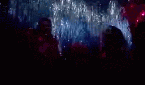 Blurry Crowd Dancing In Dark Room GIF