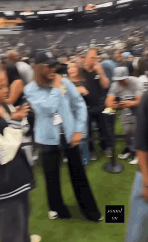 A Blurry Picture Of A Crowd Of People With The Words Sound On In The Corner GIF