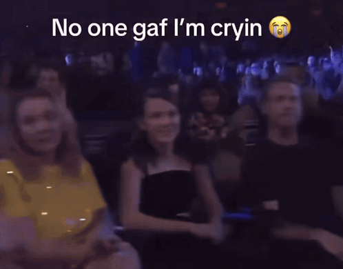 A Blurry Picture Of A Crowd With The Words No One Gaf I 'M Cryin GIF