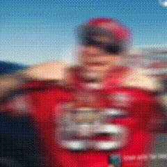 A Blurry Picture Of A Football Player Wearing A Red Jersey With The Number 28 On It GIF