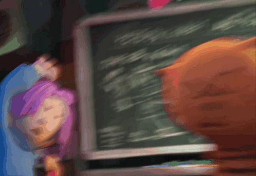 A Blurry Picture Of A Girl And A Cat Standing In Front Of A Chalkboard GIF