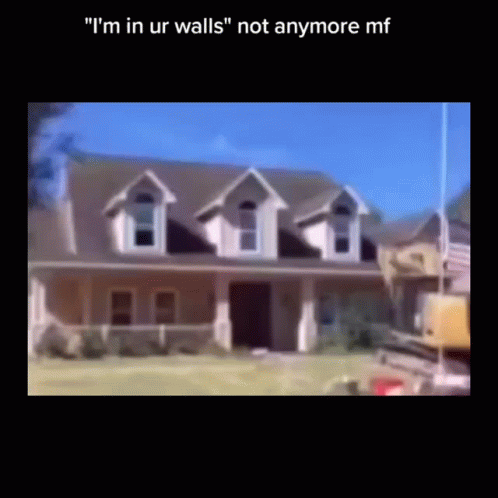 A Blurry Picture Of A House With The Words " I 'M In Ur Walls " On The Bottom GIF