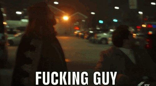 A Blurry Picture Of A Man And A Woman With The Words Fucking Guy Written On The Bottom GIF