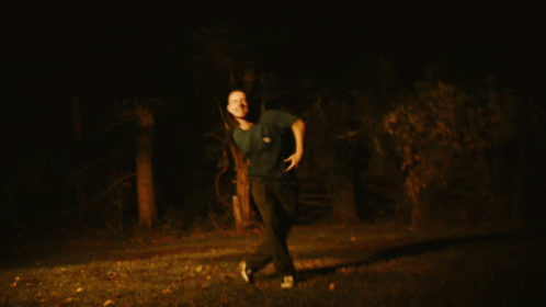 A Blurry Picture Of A Man Giving The Thumbs Up GIF