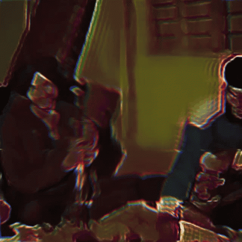 A Blurry Picture Of A Man In A Black Hat GIF