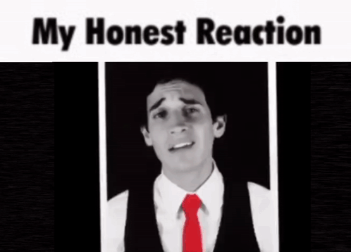A Blurry Picture Of A Man In A Suit And Tie With The Caption My Honest Reaction . GIF