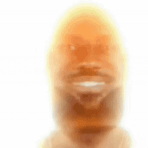 A Blurry Picture Of A Man 'S Face With A Beard . GIF