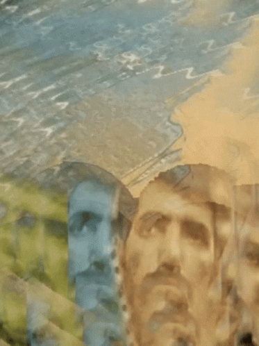 A Blurry Picture Of A Man 'S Face With The Letter Z On The Bottom GIF