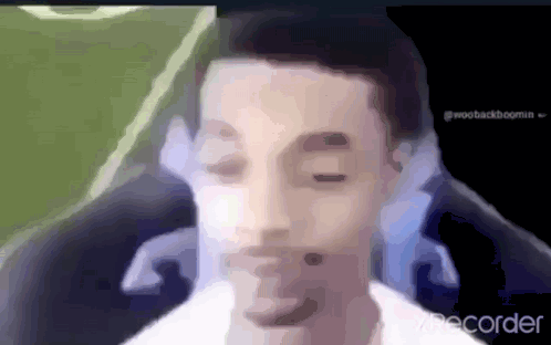A Blurry Picture Of A Man 'S Face With The Word Recorder In The Corner . GIF