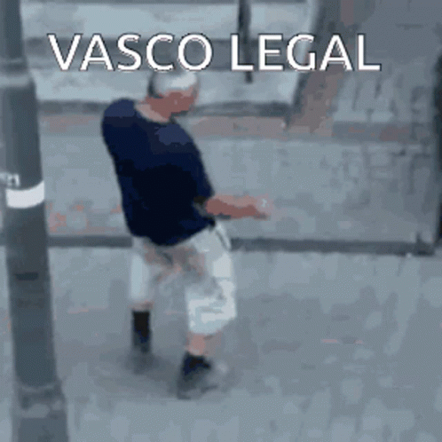 A Blurry Picture Of A Man Walking With The Words Vasco Legal In The Background GIF