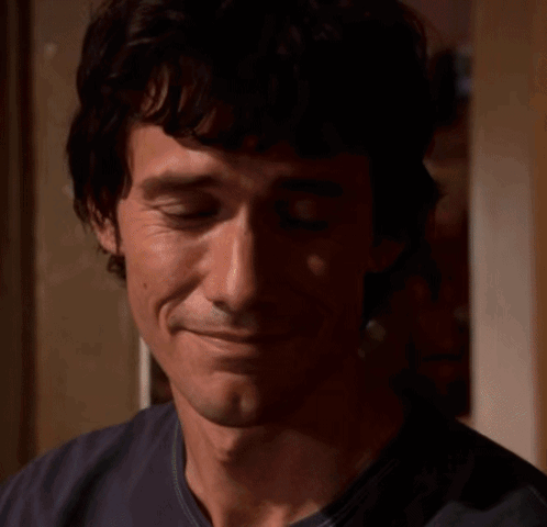 A Blurry Picture Of A Man Wearing Headphones With The Word Edit In The Background GIF