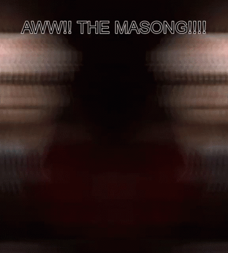 A Blurry Picture Of A Man With A Flower Crown On His Head Says Aww The Masong GIF
