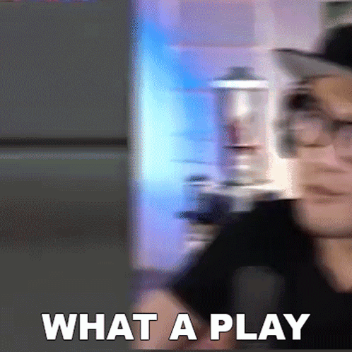 A Blurry Picture Of A Man With Glasses And The Words What A Play In White Letters GIF