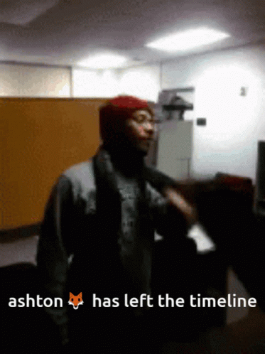 A Blurry Picture Of A Man With The Words Ashton Has Left The Timeline GIF
