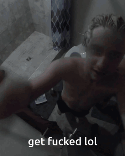 A Blurry Picture Of A Man With The Words Get Fucked Lol Written Below Him GIF