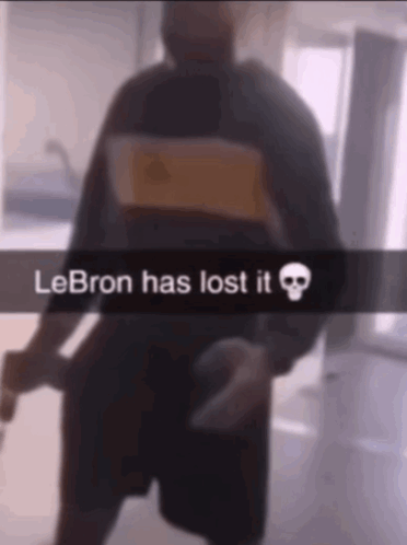 A Blurry Picture Of A Man With The Words Lebron Has Lost It On It GIF