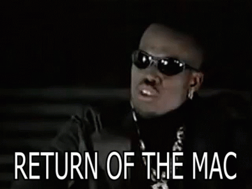 A Blurry Picture Of A Man With The Words Return Of The Mac Written Below Him GIF
