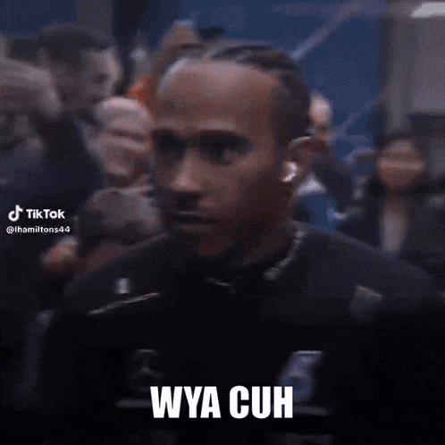 A Blurry Picture Of A Man With The Words " Wya Cuh " On The Bottom GIF