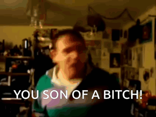 A Blurry Picture Of A Man With The Words " You Son Of A Bitch " On The Bottom GIF