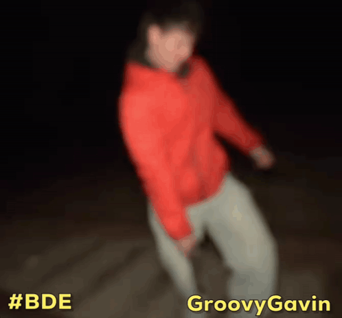A Blurry Picture Of A Person Dancing With The Words Groovy Gavin Above GIF