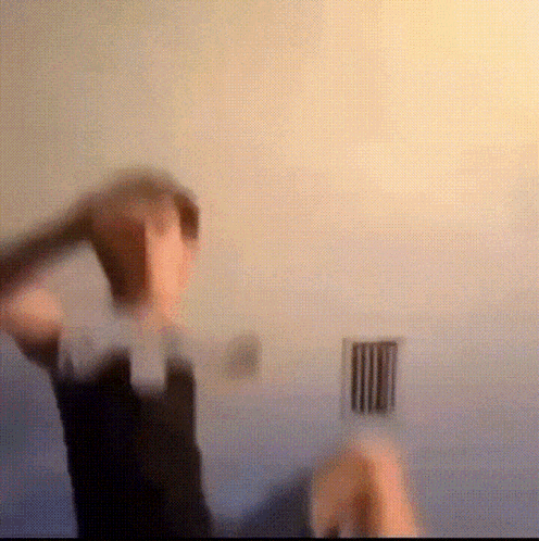 a blurry picture of a person holding a microphone that says nct