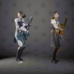 A Blurry Picture Of A Person Holding A Sword And A Picture Of A Person Holding A Sword GIF