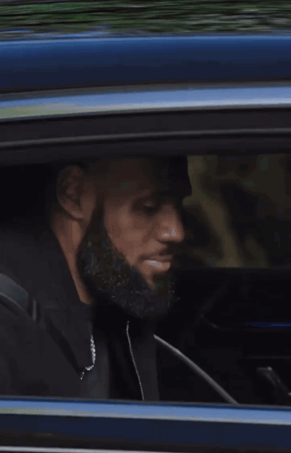 A Blurry Picture Of A Person In A Car GIF