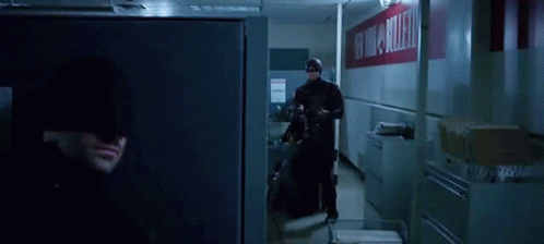 A Blurry Picture Of A Person In A Dark Room GIF
