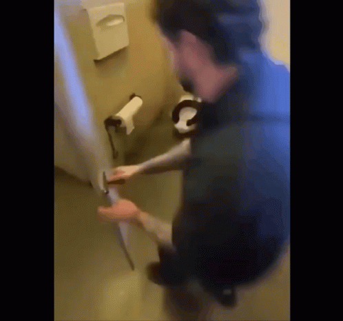 A Blurry Picture Of A Person Opening A Door GIF