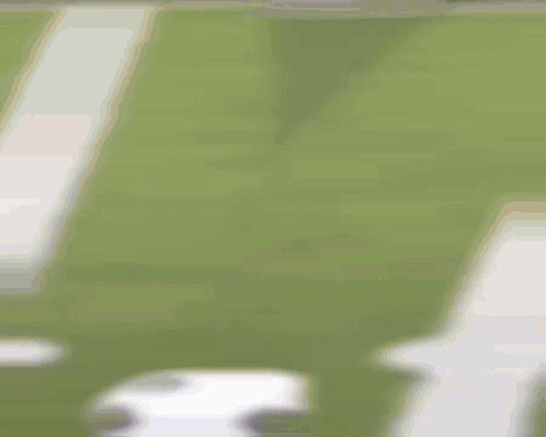 A Blurry Picture Of A Person Playing A Game Of Soccer GIF