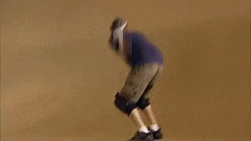 A Blurry Picture Of A Person Riding A Bike On A Dirt Track GIF
