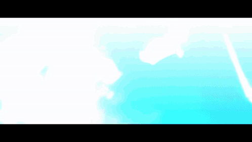 A Blurry Picture Of A Person 'S Face With A Blue Background . GIF