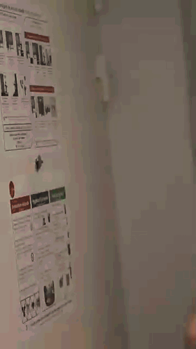 a blurry picture of a person 's face with a white shirt on