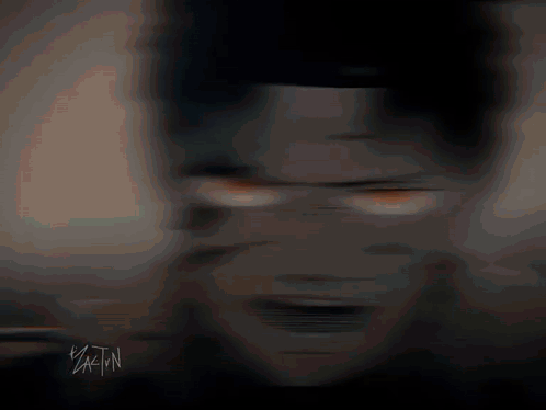 A Blurry Picture Of A Person 'S Face With The Name Yactn On The Bottom GIF