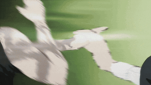 a blurry picture of a person 's hand reaching out towards another person