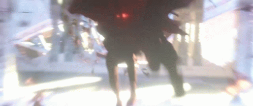 A Blurry Picture Of A Person Standing In A Room GIF