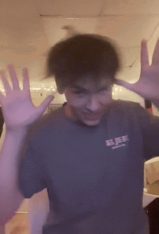 A Blurry Picture Of A Person Wearing A Shirt That Says Rvr On It GIF
