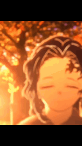 A Blurry Picture Of A Person With A Tree In The Background GIF