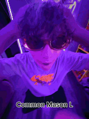 A Blurry Picture Of A Person With The Name Common Mason L On It GIF