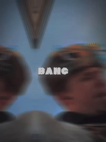 A Blurry Picture Of A Person With The Word Bang Written On It GIF