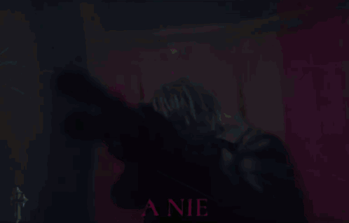 A Blurry Picture Of A Person With The Word Biggest In The Background GIF